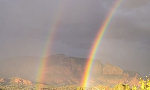 A double rainbow against the red rocks in magical Sedona, AZ